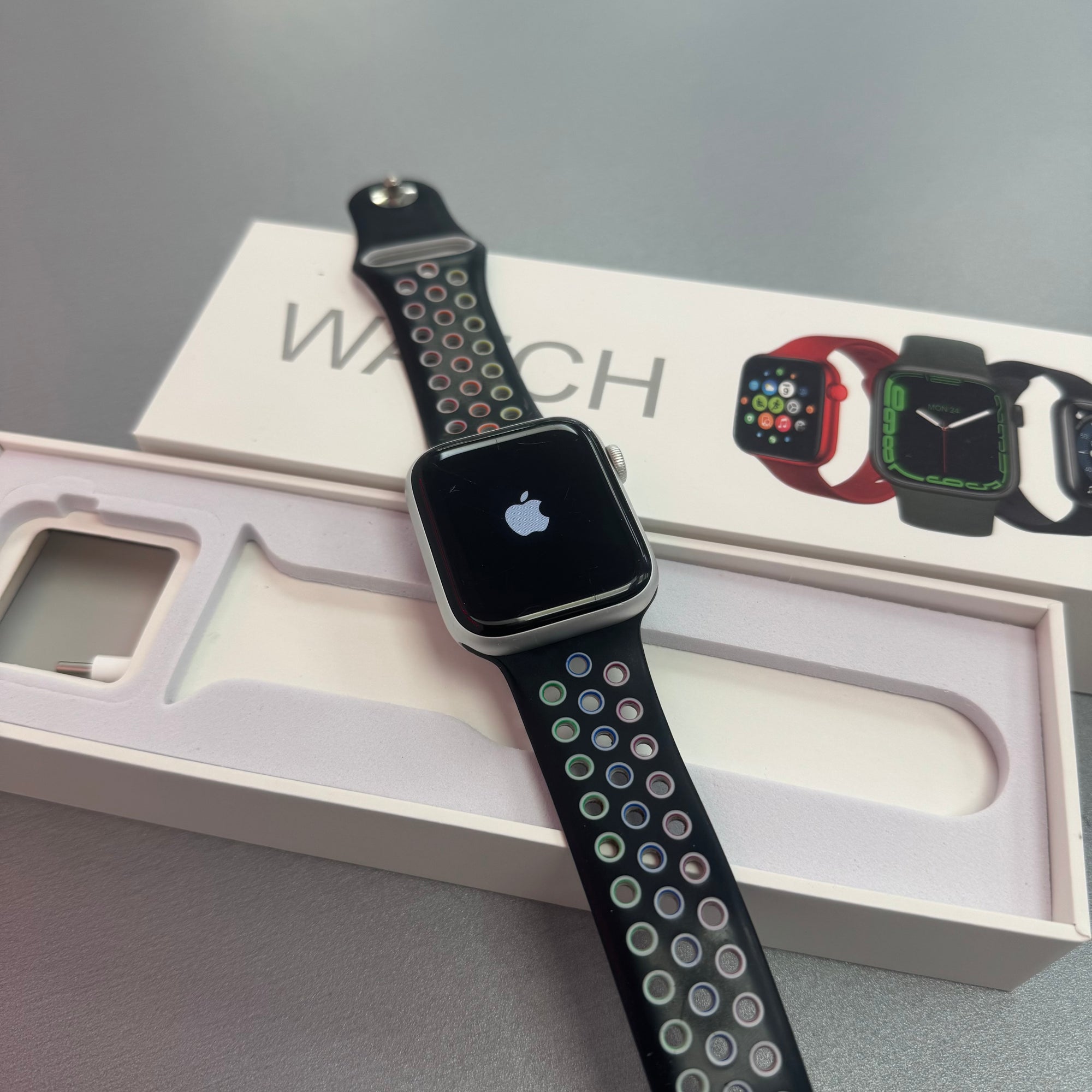 Apple Watch Series 5, 44mm GPS and Cellular Silver Aluminium Case & Black Sports Band