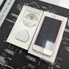 Smartphone with charging cable and adapter in a box on technical drawings